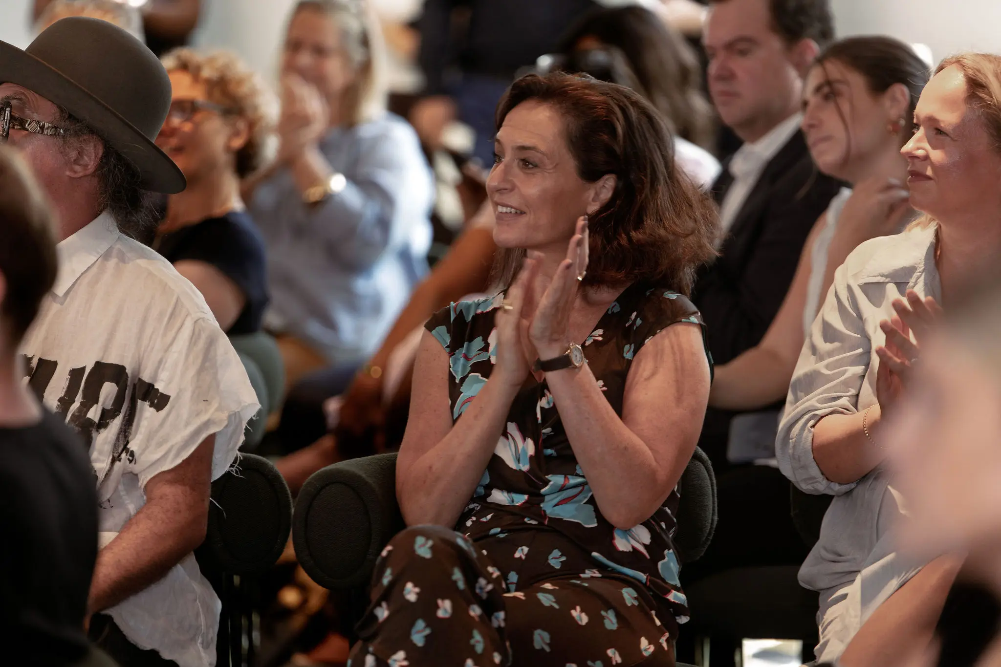 Audience members applauding during a Future Forum leadership and innovation event in London